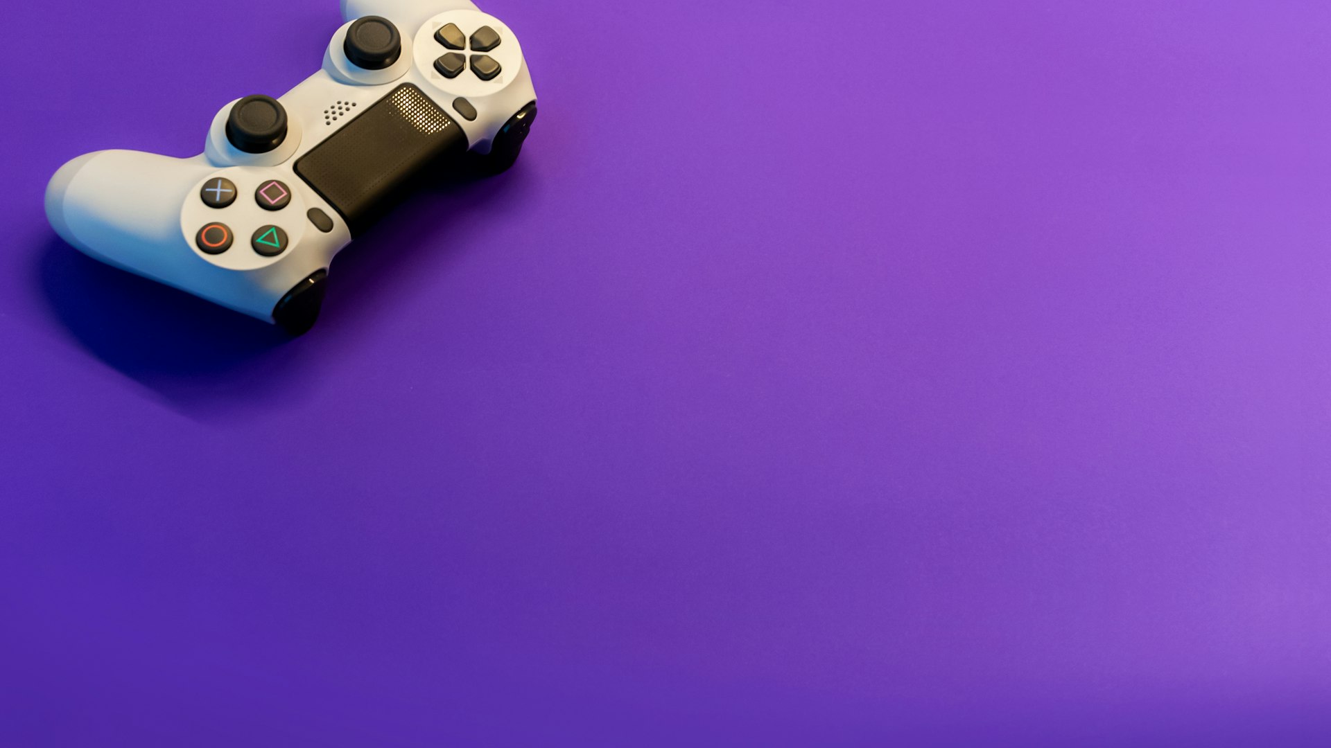 A cool-toned gaming setup with glowing peripherals